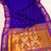 Kushmanda royal blue pure silk Paithani with purple border and peacock gold pallu