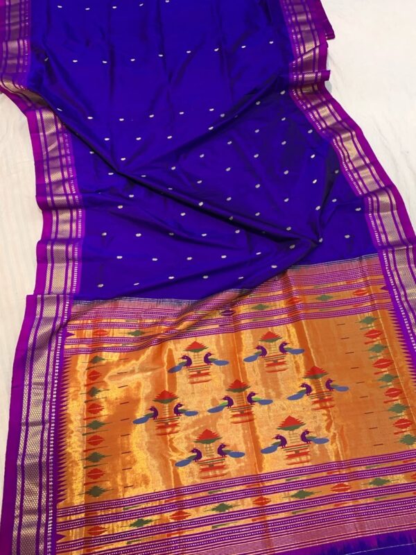 Kushmanda royal blue pure silk Paithani with purple border and peacock gold pallu