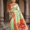 Pastel Mint Paithani model wearing a handwoven pure silk saree