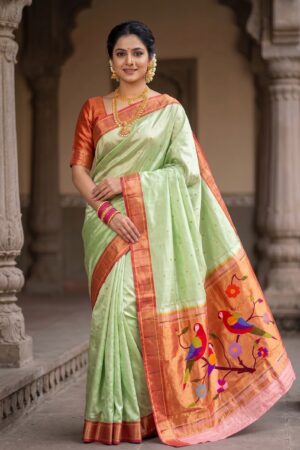 Pastel Mint Paithani model wearing a handwoven pure silk saree